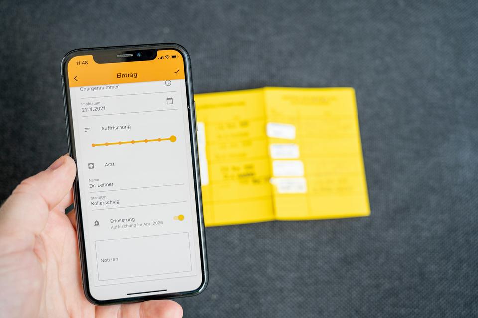A phone and a printed document.