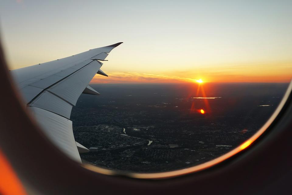 Sunset seen from an airplane window.