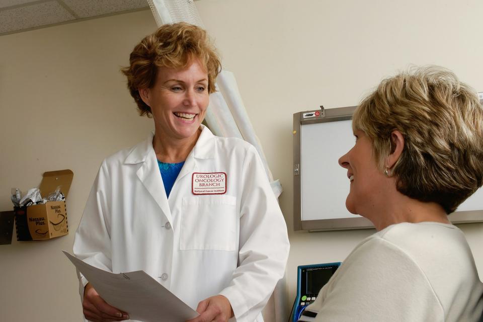 A doctor talks with a patient.