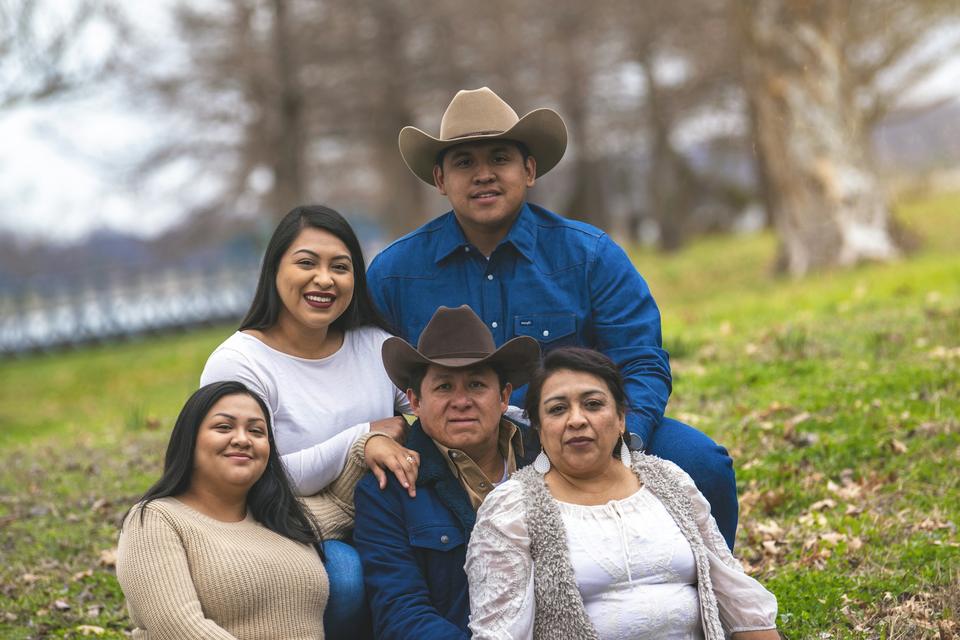 A multigenerational family outdoors.